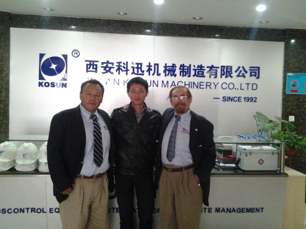 International Business Staff(in the middle) and Two Mexican Visitors(left and right) Coming Afar